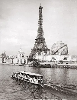 Eiffel Tower, boat on the river Seine, World Fair, 1900