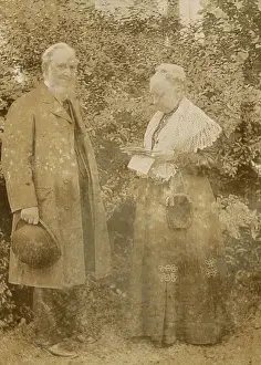 Elderly Victorian couple in a garden