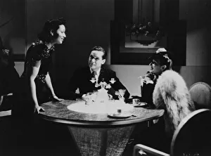 African American Gallery: Elisabeth Welch sings to Griffith Jones & Ann Dvorak