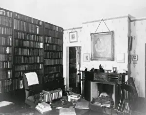 Fire Place Prints: Emersons study showing shelves of books, fireplace and desk