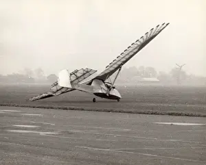 Crashes Prints: Emiel Hartman crashes in his man-powered ornithopter