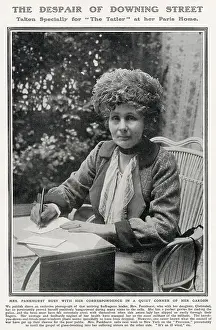 Correspondence Prints: Emmeline Pankhurst pictured working on correspondence at her home in Paris in a photograph taken exclusively for The
