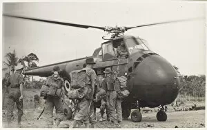 Emplaning and disembarking from a Westland Whirlwind helicop