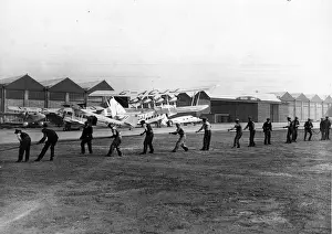Croydon Prints: Engineers laying a new electric cable at Croydon Airport
