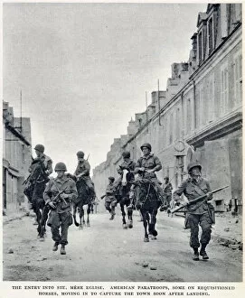 The entry of American paratroops into St. Mere Eglise, Normandy, shortly after D-Day