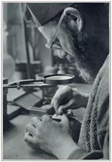 Images Dated 23rd December 2019: Eric Gill, sculptor and printmaker, at work
