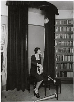 Tied Collection: Ethel Beenham, Harry Price's secretary, demonstrates how a skilful medium can perform any number