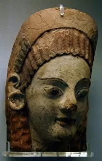 Antefix Collection: Etruscan painted antefix with shaped head of woman. 520-500