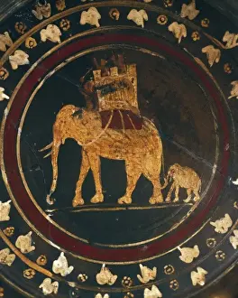 Ceramics Prints: Etruscan plate with a war elephant fighting against