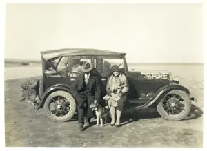 Suitcases Prints: European couple with dog and car, Middle East