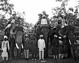 Europeans on elephants, India