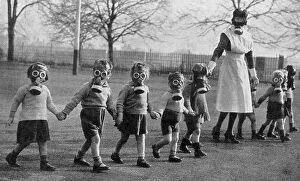 Windsor Gallery: Evacuee children in gas masks near Windsor, 1941
