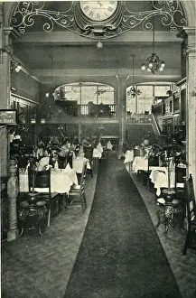 Tablecloths Prints: Example of an Edwardian restaurant interior notable for some art nouveau style ironwork