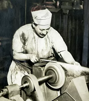 Images Dated 2nd January 2019: Expert grinder at Wilkinson Sword Works, WW1