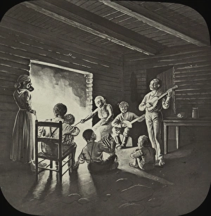 African American Gallery: An extended African-American family round the fire