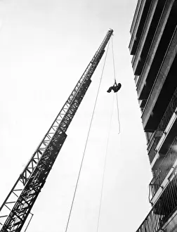 Extended Prints: Extended ladder with man hanging in harness