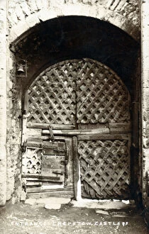 The fabulous gateway entrance to Chepstow Castle, Wales - lattice-work doors showing the repairs of age