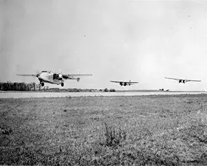 Fairchild C-82 Packet towing a CG-15 and CG-4A glider