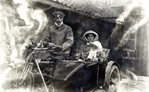 Family of three on a 1914 Twin Rex motorcycle & sidecar