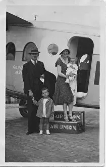 A family boarding an aeroplane, the Rapid Azur service of the Air Union line in July 1932