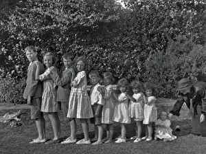 Babies Prints: Family of ten children standing in a line