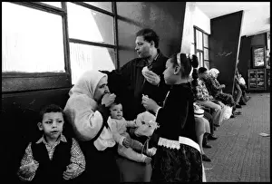 Family eating Alexandria Railway station, Egypt
