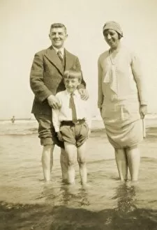 Images Dated 20th June 2011: Family of three enjoying a paddle in the sea