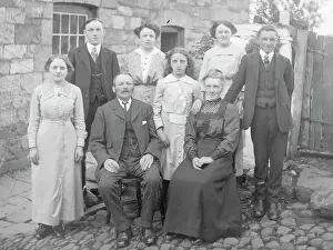 Cobble Stones Prints: Family group in cobbled courtyard, Mid Wales