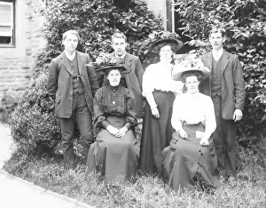 Family group of six in a garden, Mid Wales