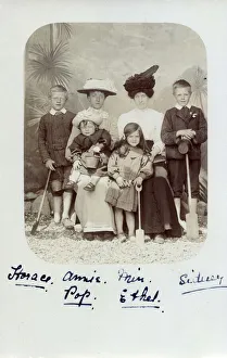 Buckets Prints: Family group - Studio portrait at the seaside