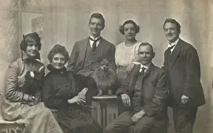 Lapdog Prints: Family group studio portrait with small dog