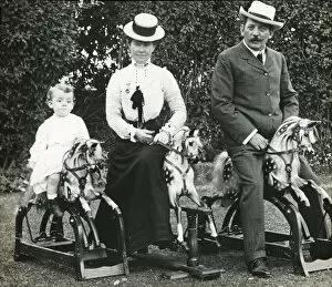 Family on three rocking horses