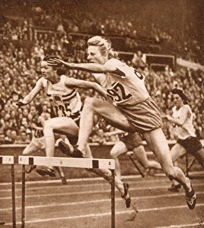 Images Dated 14th July 2011: Fanny Blankers-Koen hurdling, 1948 London Olympics