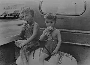 Cones Prints: Farm boys eating ice-cream cones. Washington, Indiana