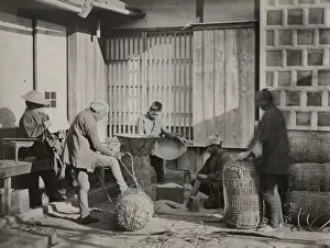 Rice Collection: Farm workers packing bales of rice, Japan