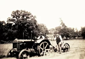 Farmers haymaking