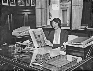 Ledger Prints: Fashionable woman sitting at a desk