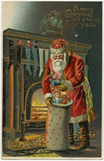 Father Christmas - selecting gift from his sack Father Christmas - selecting gift from his sack