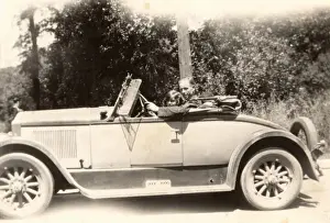 Spin Prints: Father and daughter in sports coupe