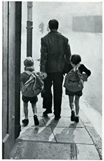 Evacuation Prints: A father leads his two children to be evacuated 1939