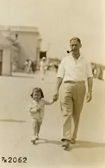Images Dated 19th May 2017: Father and young daughter take a stroll - Promenade, Margate