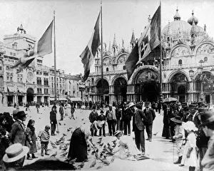 Feeding pigeons, St Marks Square, Venice, Italy