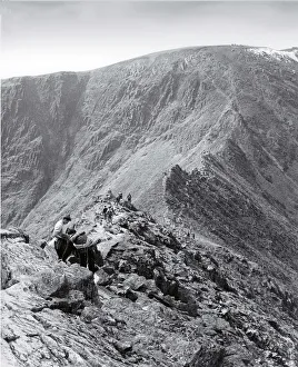 Images Dated 30th October 2019: Fell walkers on Striding Edge leading to Helvellyn, Lake Dis