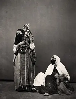 Covering Prints: Fellahin or Fellah women, agrcultural workers children, Egyp