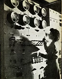 Checking Collection: Female BBC engineer checking equipment, WW2