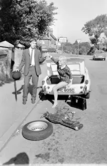 Assistant Prints: Female contortionist Diana Gaye and car boot