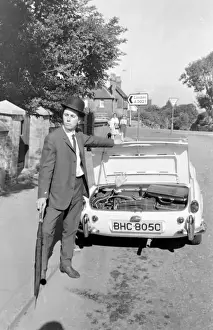Female contortionist Diana Gaye and car boot