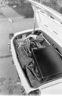 Female contortionist Diana Gaye and car boot