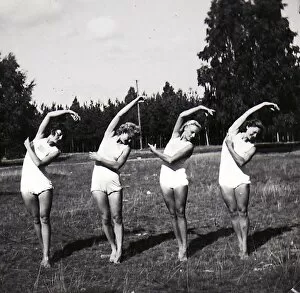 Gymnasts Gallery: Four female gymnasts in row