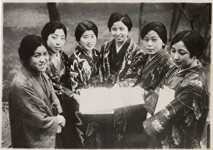 Six female Japanese music students in traditional dress. Date: 1930s